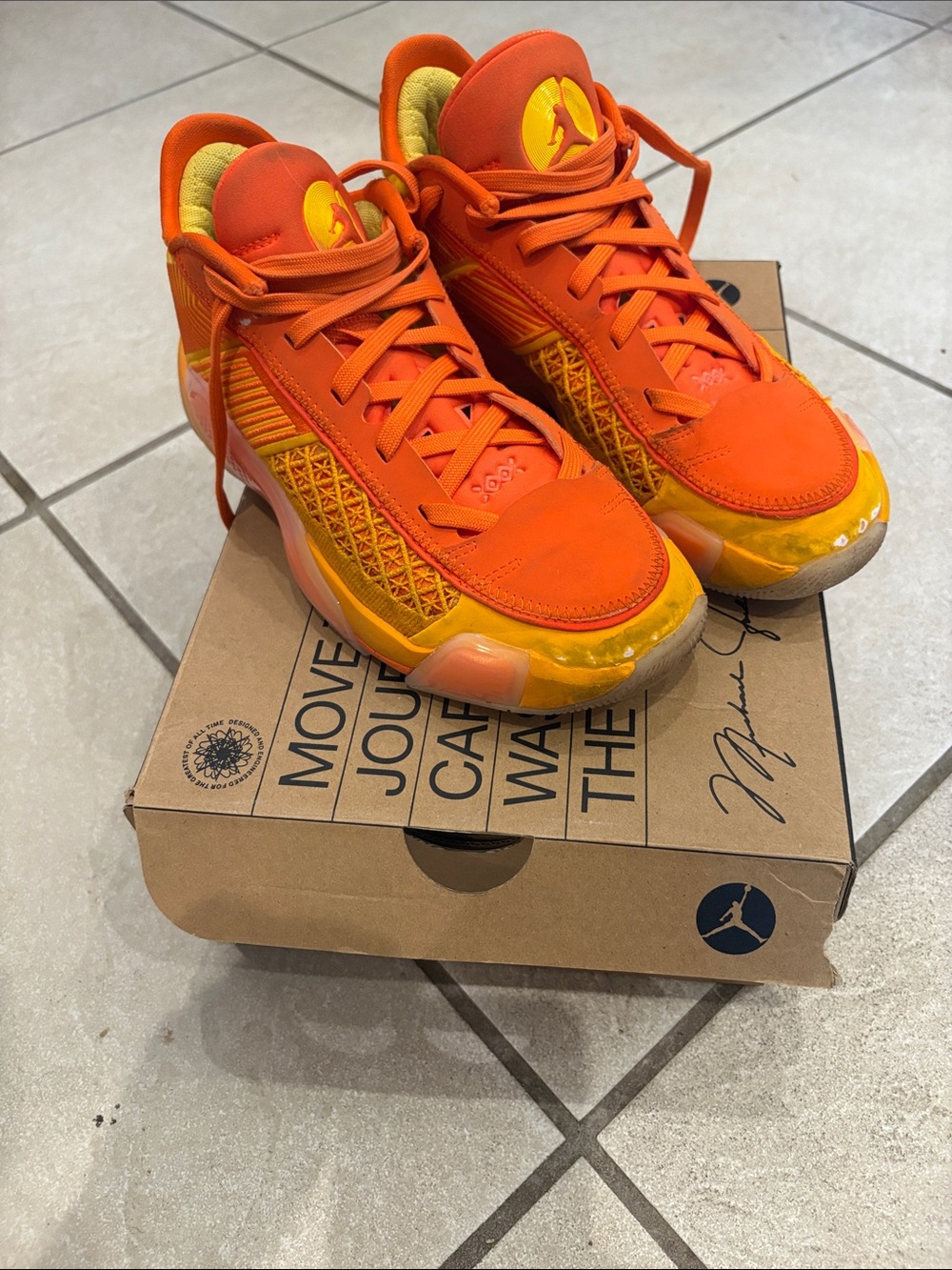 Jordan Orange and Yellow High-Top Sneakers